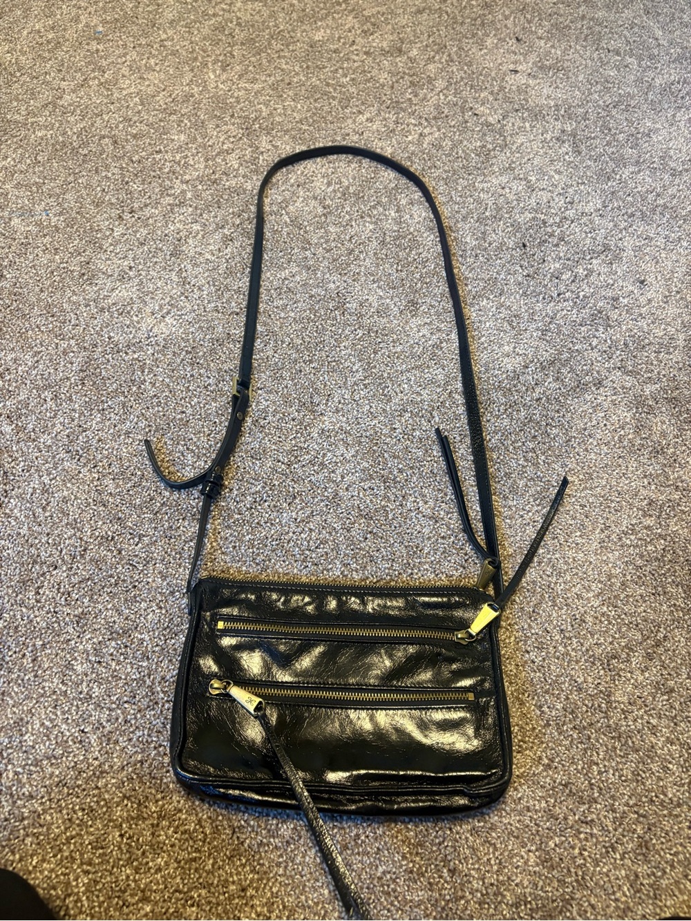 HOBO Black Patent Leather Crossbody Bag with Gold Hardware